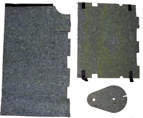 Drei Teile aus grauem, gepresstem Material, die zur Isolierung eines Verdichters verwendet werden, erkennbar an den Schnittkanten und Befestigungselementen. Geeignet für Wolf-Produkte.